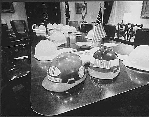 Hard hats on cabinet table after Nixon meeting with construction trades group (05/26/1970) less than three weeks after the New York City Hard Hat Riot